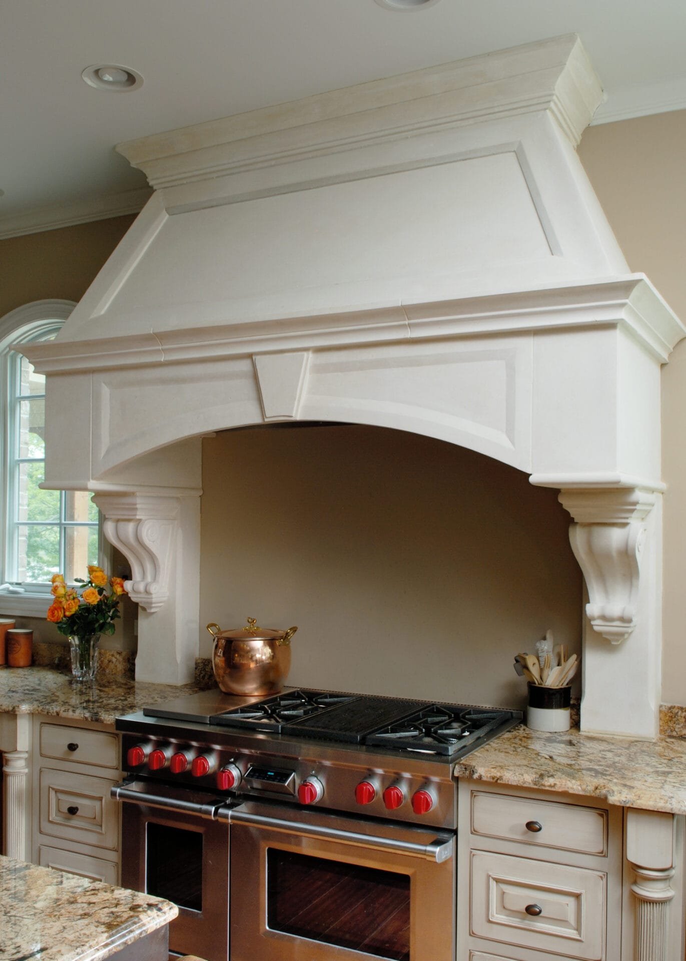Atelier Jouvence | Hand Carved Stone Fireplaces & Furniture - Range Hoods