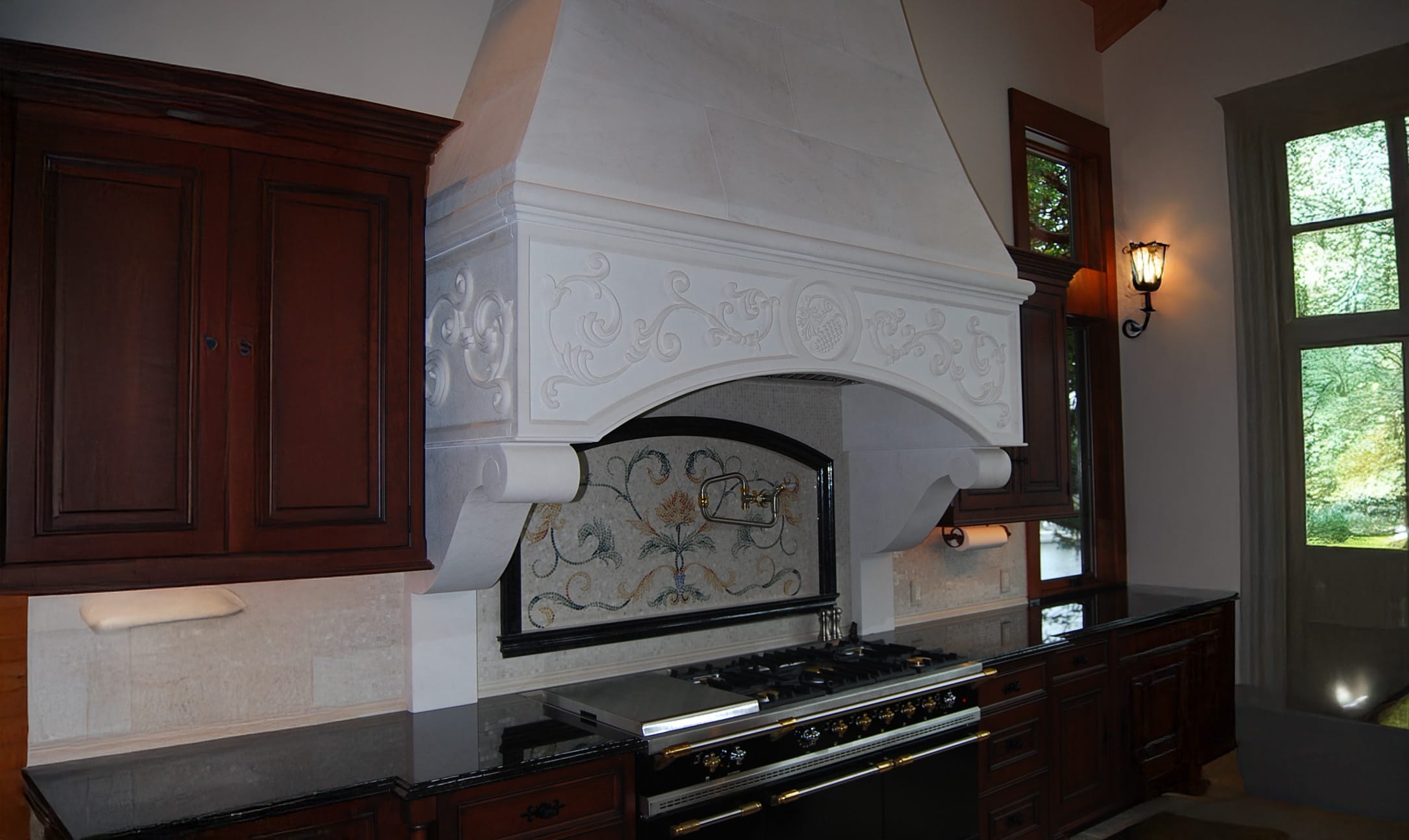 Custom stone range hood.JPG