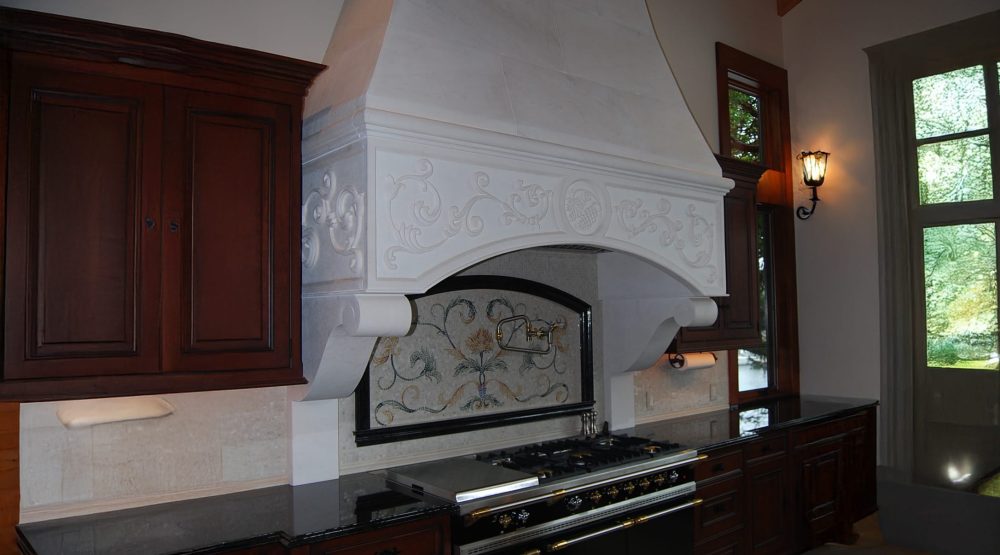 Custom stone range hood.JPG